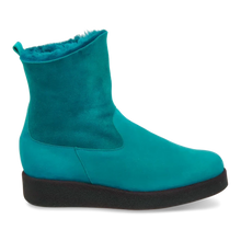 <p>These boots feature a stylish appearance thanks to their voluminous sole. The wool&nbsp; &nbsp;lining provides cozy warmth for your feet. The wide circumference of the shaft ensures effortless on and off.</p> <p>Arche's aesthetic is both stylish and sophisticated, offering unique and comfortable designs.&nbsp;</p>